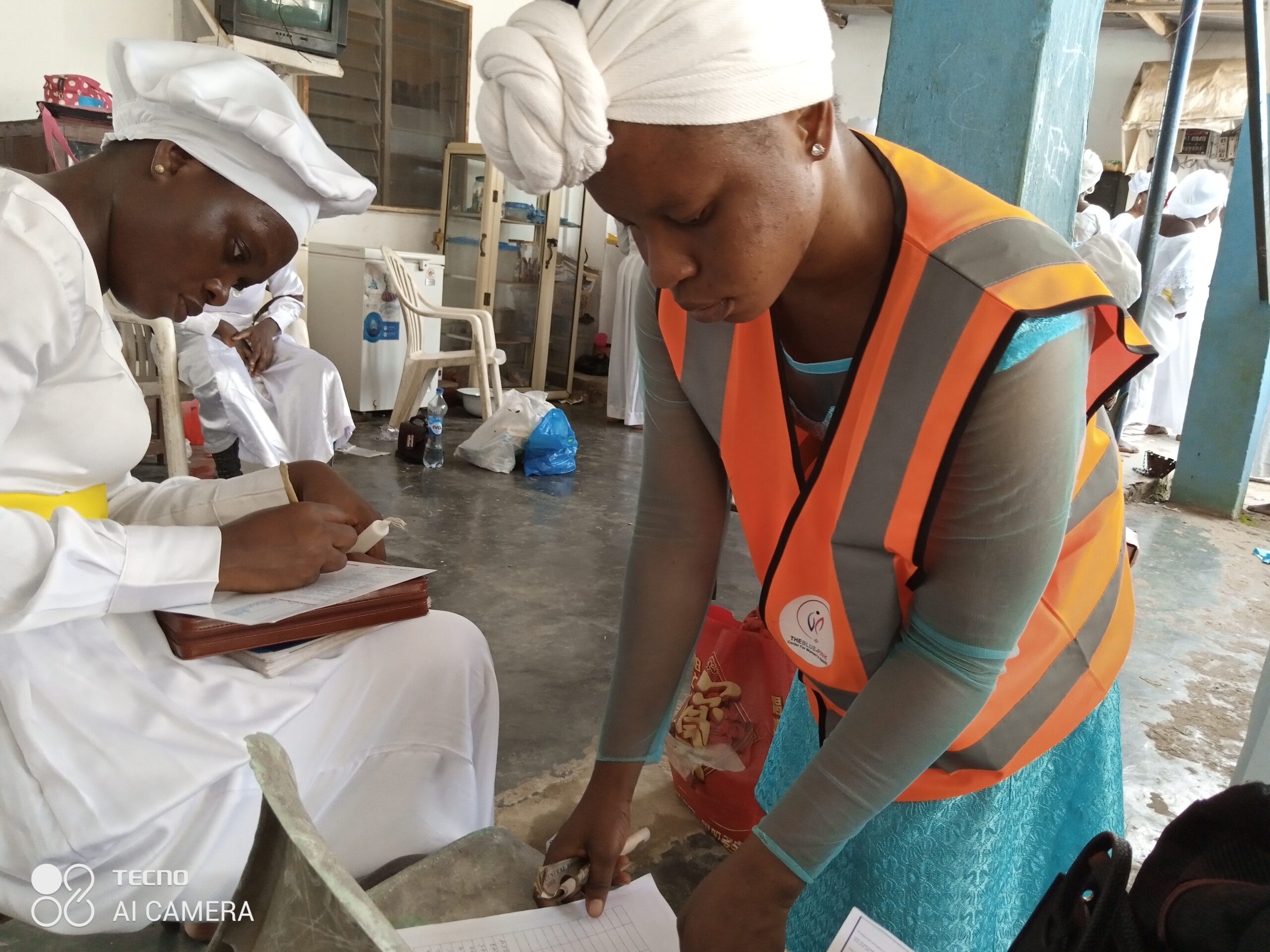 White Garment Church’s Women Sips from the Blue-Pink Cup for Optimal Health